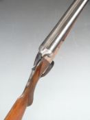 Geco 12 bore side by side shotgun with engraved lock, chequered semi-pistol grip and forend,