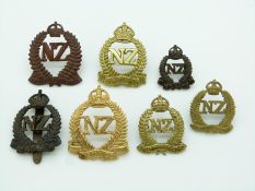 Seven New Zealand Army WWI New Zealand Expeditionary Force metal hat and collar badges