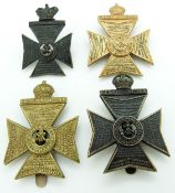 Four British Army Kings Royal Rifle Corps metal hat badges