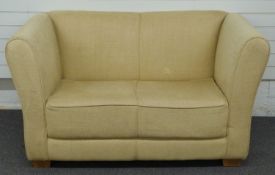 Cream upholstered sofa