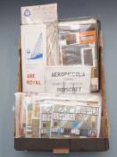 A collection of mainly 1:76 scale model kits, including aeroplanes, yachts and buildings, all in