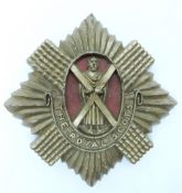 British Army Royal Scots Regiment economy plastic cap badge, A Stanley & Sons Walsall to reverse