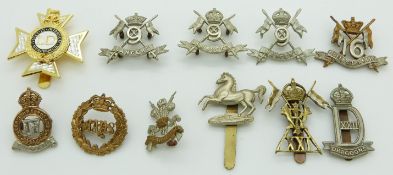 Eleven British Army 9th Lancers, 16th Lancers, 21st Lancers, 2nd Dragoons etc metal badges including
