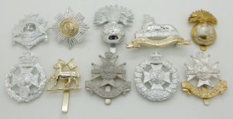 Ten British Army Infantry anodised cap badges including Inniskilling, Bedfordshire, Notts and
