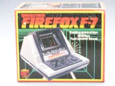 Grandstand Firefox F-7 retro tabletop mini arcade game, in original box.