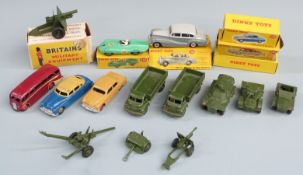 Thirteen Dinky Toys diecast model vehicles including military wagons and armoured cars, Connaught
