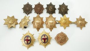 Thirteen British Army Foot Guards metal collar badges in five pairs plus three including an enamel