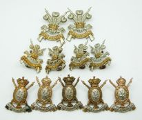 Eleven British Army 6th Dragoon Guards and 3rd Carabiniers metal badges comprising two pairs plus