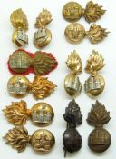 Twelve British Army Royal Inniskilling Regiment metal collar badges in three pairs plus six, one