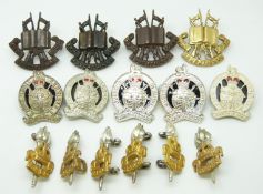 Fifteen British Army Legal and Education Corps metal collar badges in six pairs plus three