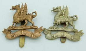 Two British Army Montgomeryshire Imperial Yeomanry other ranks white metal cap badges plus one