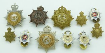 Eleven New Zealand Army Royal New Zealand Army Service Corps metal and anodised hat and collar