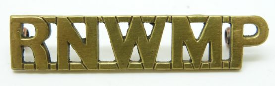 Canada Royal North West Mounted Police brass shoulder title by J.R Gaunt of London