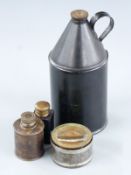 Four various gun or similar oil bottles and tins, largest 16.5cm tall.