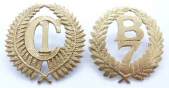 Two New Zealand Army WWI 1st Reinforcements Company and 7th Reinforcements Company metal hat badges