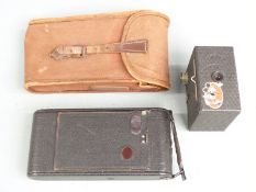 Ensign Mickey Mouse box camera with sticker depicting Mickey to front and a folding bellows camera