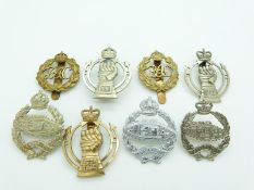 Eight British Army Royal Armoured Corps and Royal Tank Regiment metal badges