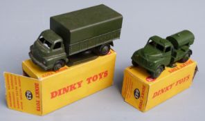 Two Dinky Toys diecast model vehicles Army Covered Wagon 623 and Army Water Tanker 643, both in