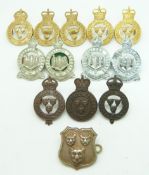 Thirteen British Army Shropshire Yeomanry and Northumberland Hussars metal collar badges in four