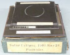 Fourteen late 19th and early 20th century photographic glass positives depicting solar eclipses,