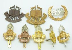 Seven British Army Royal Army Education Corps metal badges together with an Army Scripture Readers