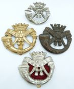 Four British Army Cornwall Light Infantry metal badges