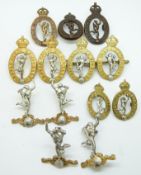 Thirteen British Army Royal Corps of Signals metal collar badges in six pairs plus one