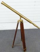 Brass telescope on wooden extending tripod, length of telescope 100cm
