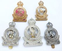 Five British Army Surrey Yeomanry metal cap badges