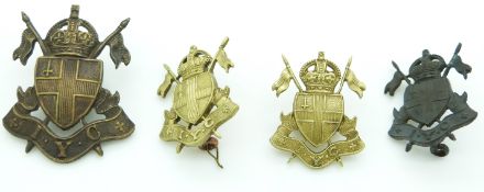 Four Imperial Yeomanry metal cap and collar badges