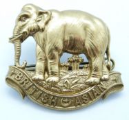 British Army King's Colonials British Asia metal hat badge