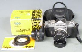 Soligor TM SLR camera, with Soligor 50mm and 135mm telephoto lenses and Helios wide angle f=28mm