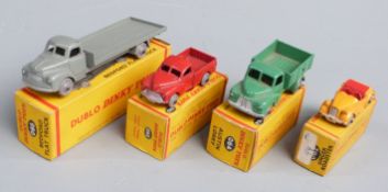 Four Dublo Dinky Toys diecast model vehicles Singer Roadster 062, Austin Lorry 064, Morris Pick-Up
