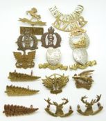 Seventeen New Zealand Army metal cap badge, collar badges and shoulder titles including 6th Manawatu