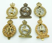 Six British Army Veterinary Corps / Royal Army Veterinary Corps cap badges including bronze Gaunt of