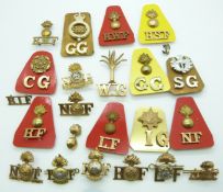 British Army a small collection of metal shoulder titles for the Guards Brigade including