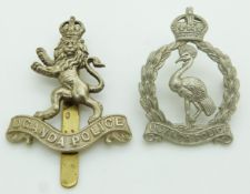 Two Uganda Police metal badges