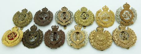 Twelve British Army Royal Engineer metal cap badges including two gilt examples