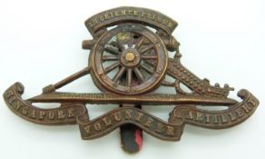 Singapore Volunteer Artillery metal cap badge