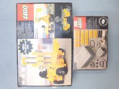 Two Lego building sets Fork Lift Truck 850 (1977) and 4.5v Tecnical Motor 870 (1977), both in