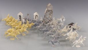 Thirty-nine white metal/ lead model soldiers and accessories including cavalry.