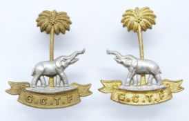 Two Gold Coast Territorial Force collar badges