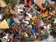 A very large collection of Britains and similar plastic model soldiers, cowboys and Indians.