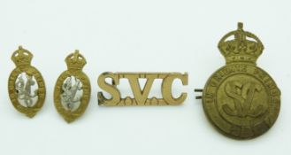 Singapore Volunteer Corps metal cap badge, collar badges and a shoulder title