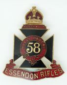 Australian Army 58th Essendon Rifles Regiment enamelled hat badge, maker's mark Angus and Coote,