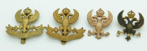 Four British Army Lanarkshire Yeomanry metal cap badges, one example by Gaunt