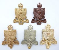 Five St Andrews University Officer Training Corps cap badges