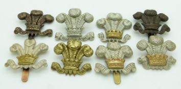 Eight British Army Denbighshire Yeomanry Hussars officer's metal cap badges including a J R Gaunt