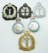 Six Royal Observer Corps post 1941 metal badges including a gilt example