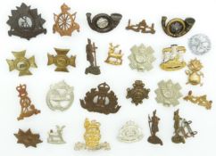 Small collection of British Army metal badges including New Zealand Regiments, King's Own